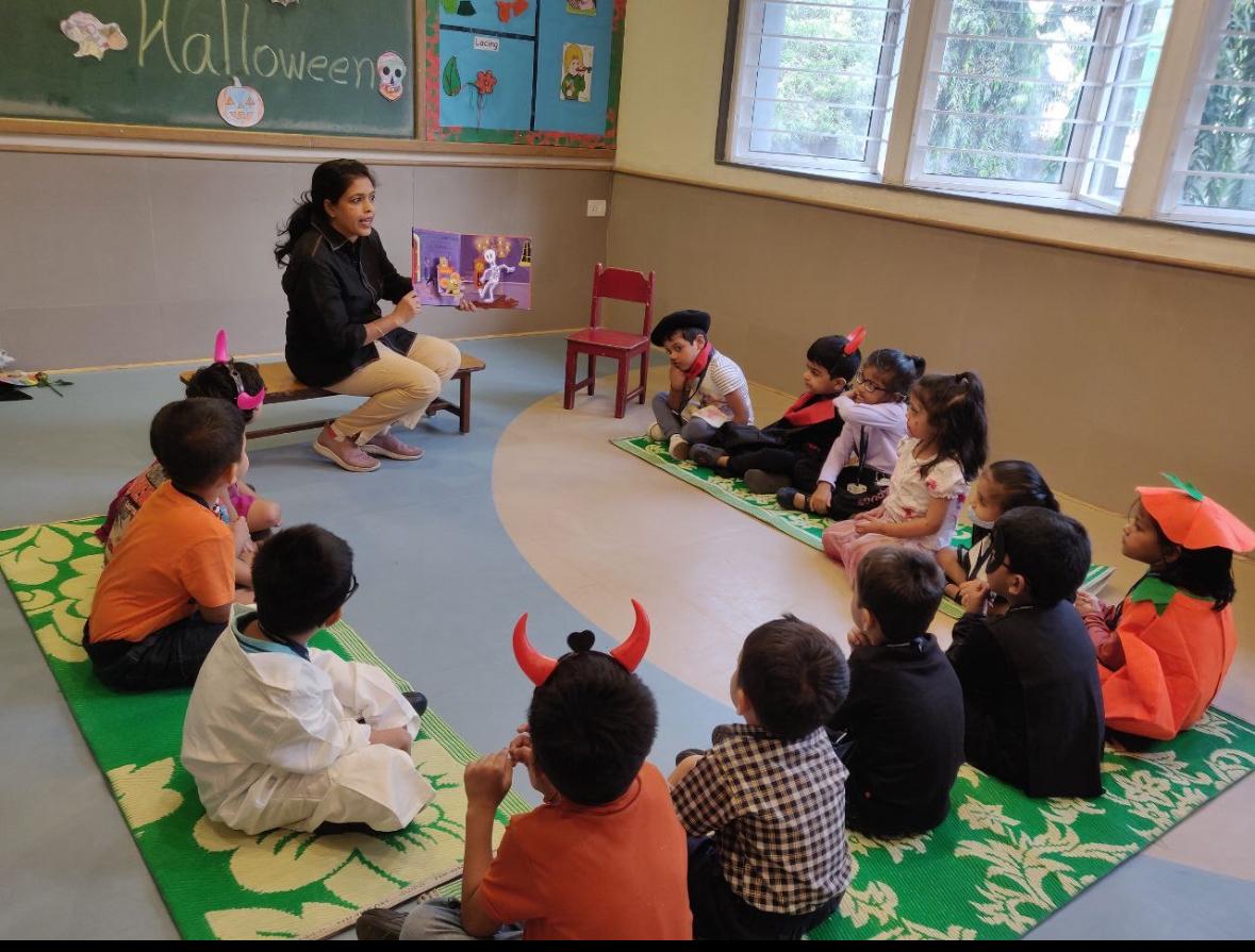 Happy children engaged in a colorful classroom activity together at VJPPS